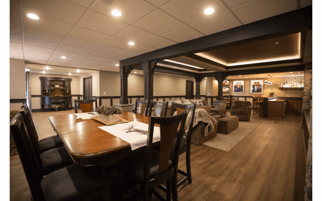 Expansive open-concept basement remodel with large dining area, movie/entertainment space, and fully stocked mini-bar.