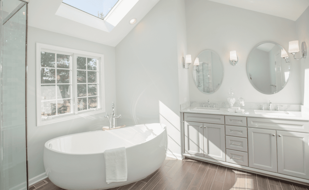 Remodeled primary bathroom with skylight